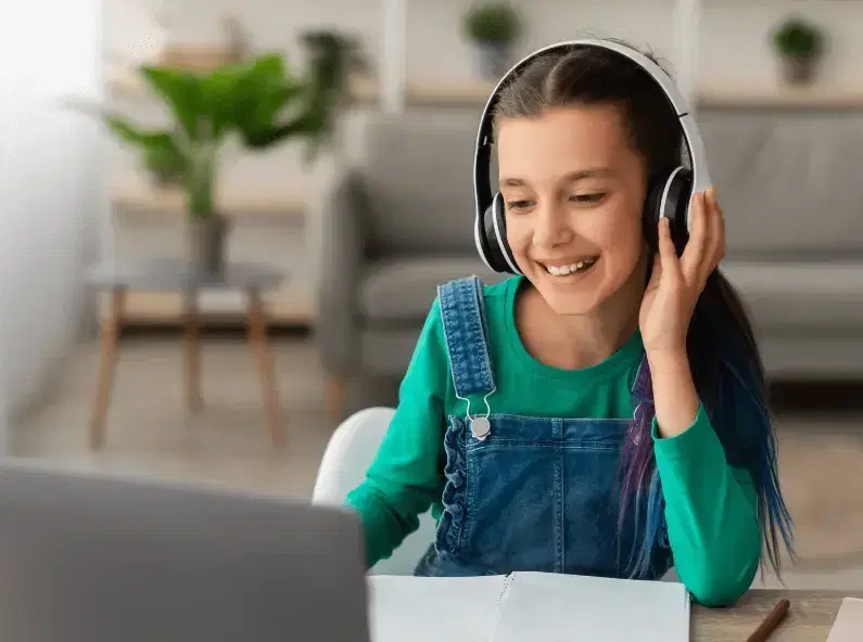 Student with headphones learning with Letterly